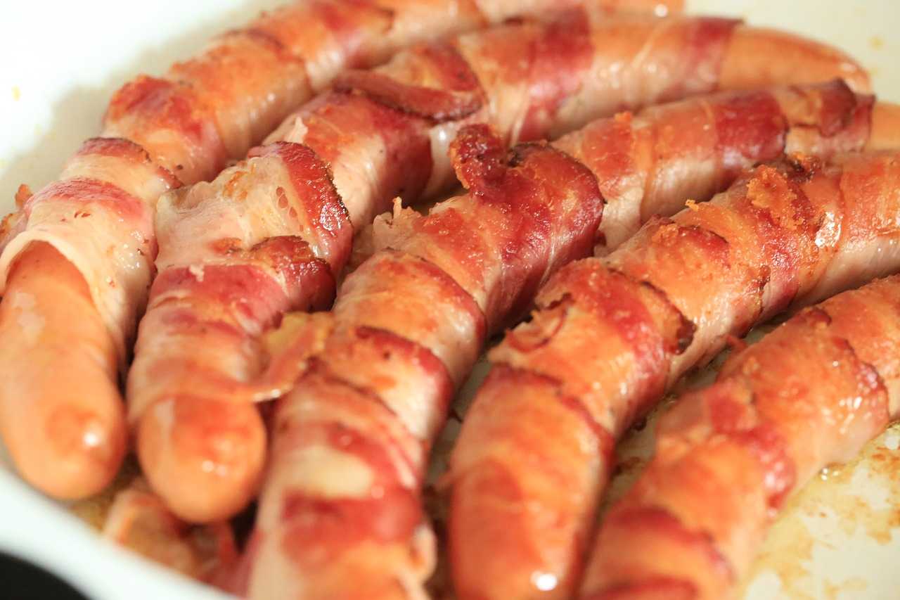 Hot dogs wrapped in bacon